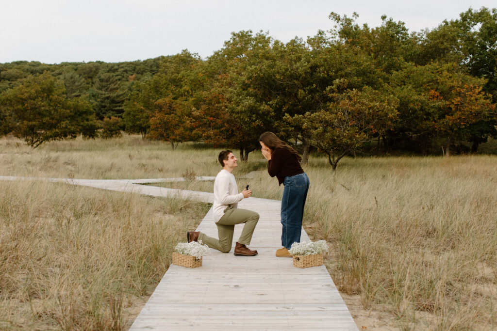 Emotional surprise proposal at Rosy Mound Natural Area in West Michigan.