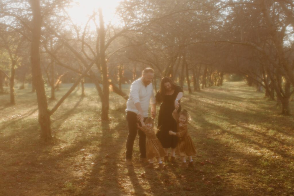 Family enjoying golden hour during a Prairie Wolf Park family session.