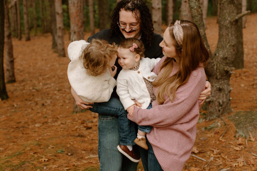 Family cuddling during photo session.